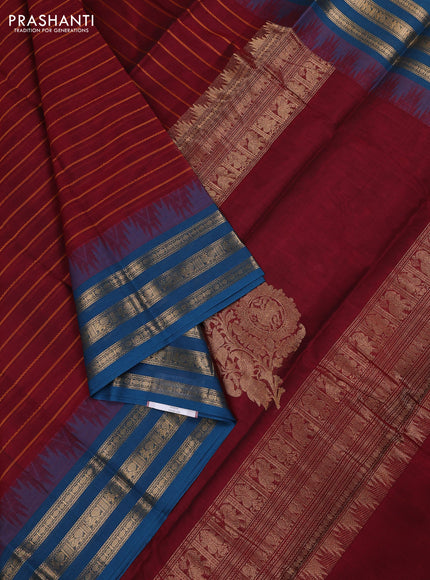 Kanchi cotton saree maroon and peacock blue with allover thread weaves and temple design zari woven border