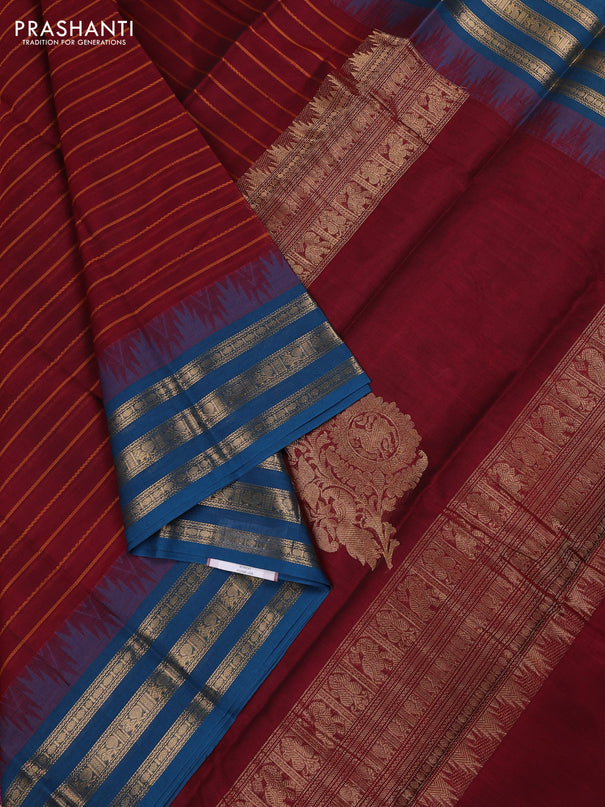 Kanchi cotton saree maroon and peacock blue with allover thread weaves and temple design zari woven border