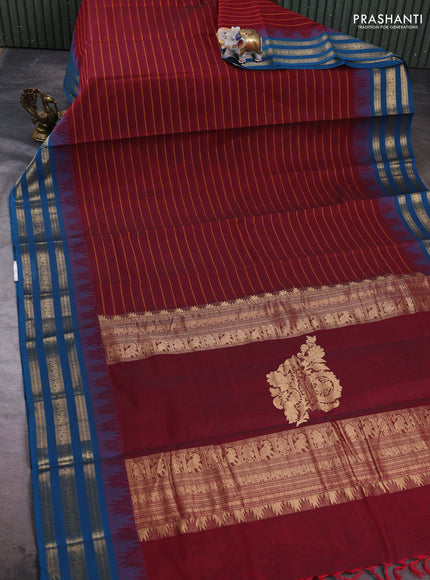 Kanchi cotton saree maroon and peacock blue with allover thread weaves and temple design zari woven border