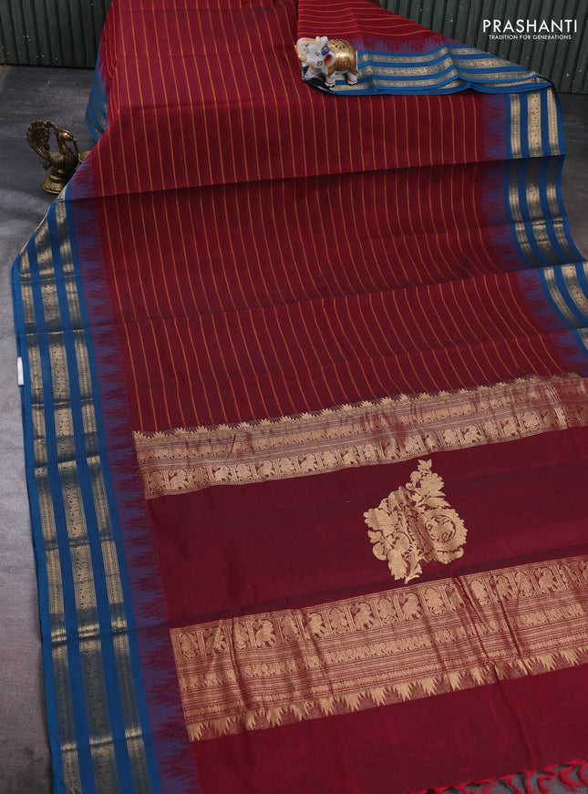 Kanchi cotton saree maroon and peacock blue with allover thread weaves and temple design zari woven border