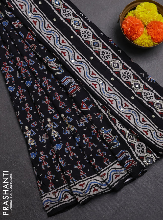 Muslin silk saree black with allover warli prints and sequin mirror work embroidery pallu