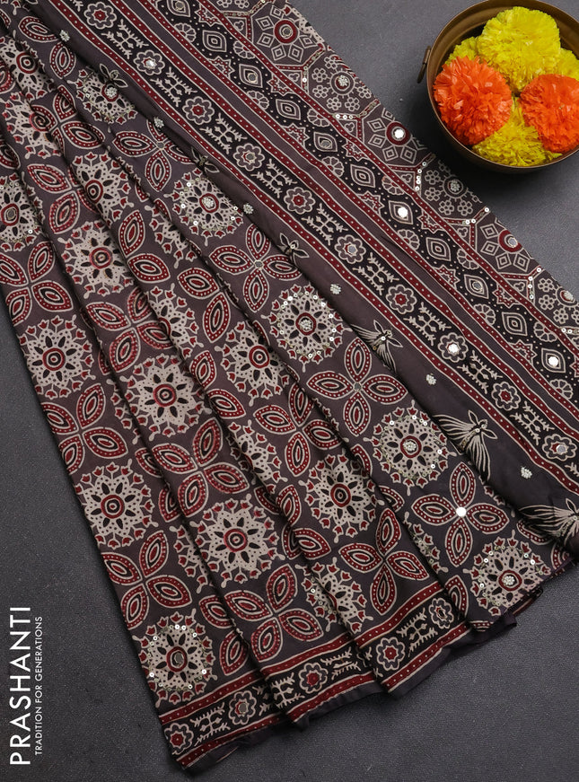 Muslin silk saree grey with allover ajrakh prints and sequin mirror work embroidery pallu