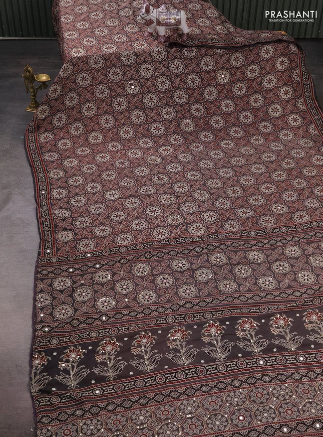 Muslin silk saree grey with allover ajrakh prints and sequin mirror work embroidery pallu