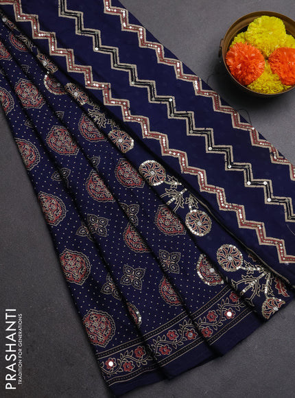 Muslin silk saree indigo blue with allover ajrakh butta prints and sequin mirror work embroidery pallu