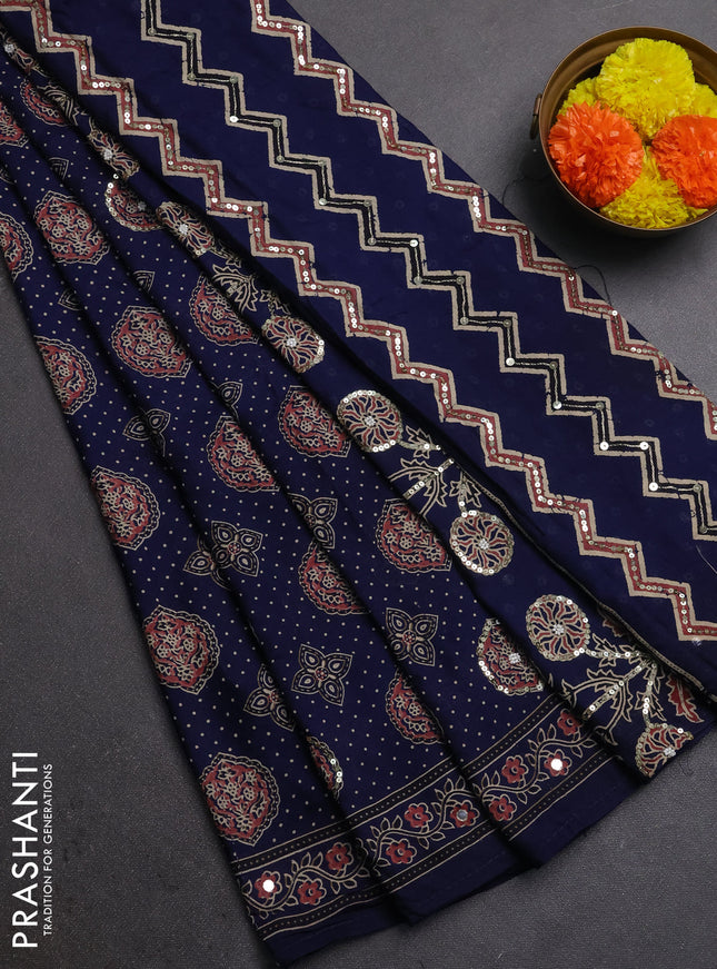 Muslin silk saree indigo blue with allover ajrakh butta prints and sequin mirror work embroidery pallu