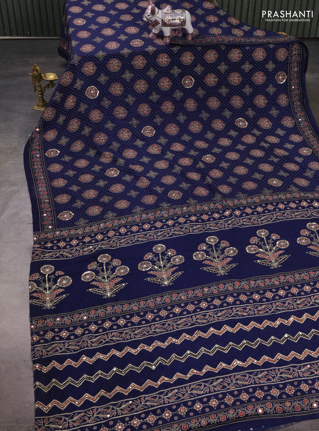 Muslin silk saree indigo blue with allover ajrakh butta prints and sequin mirror work embroidery pallu