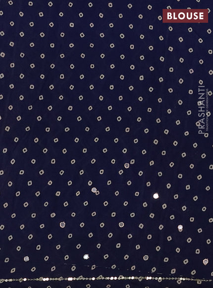 Muslin silk saree indigo blue with allover ajrakh butta prints and sequin mirror work embroidery pallu