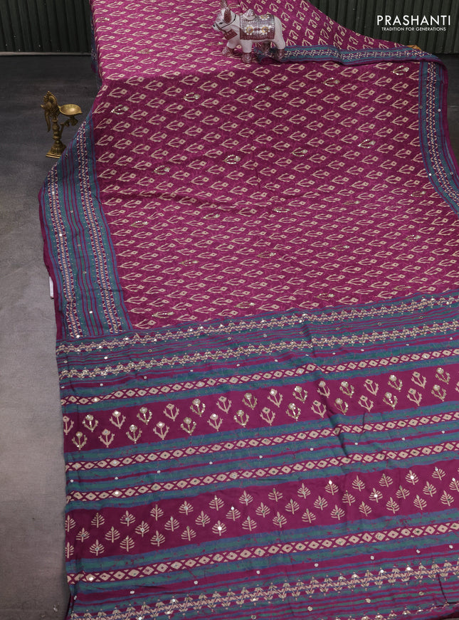 Muslin silk saree purple and teal green with allover ikat butta prints and sequin mirror work embroidery pallu
