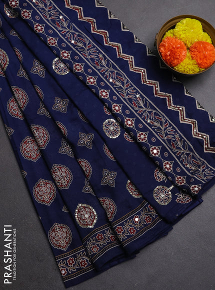 Muslin silk saree indigo blue with allover ajrakh butta prints and sequin mirror work embroidery pallu