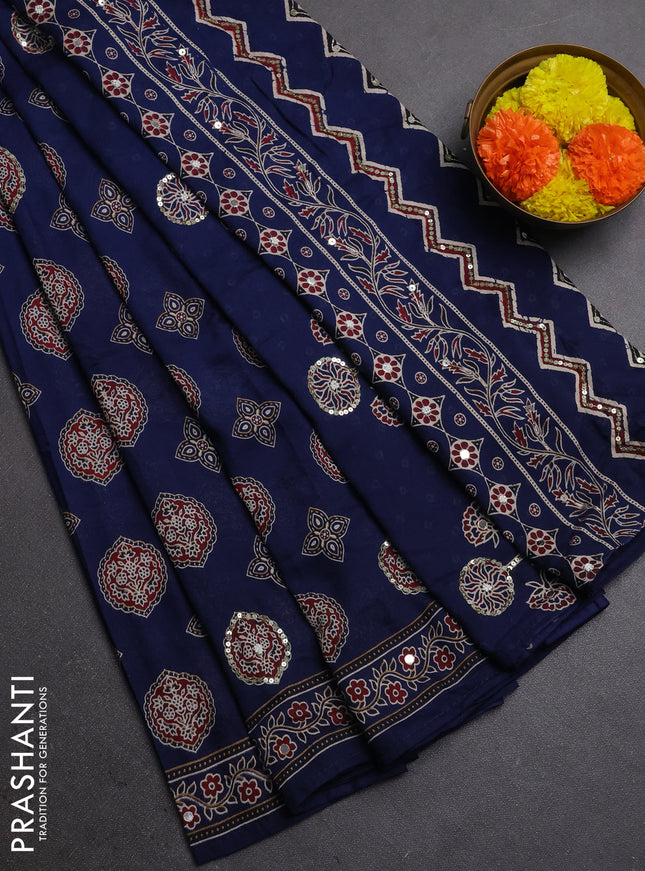Muslin silk saree indigo blue with allover ajrakh butta prints and sequin mirror work embroidery pallu