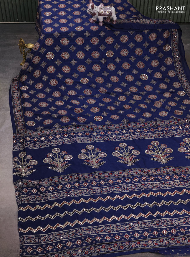 Muslin silk saree indigo blue with allover ajrakh butta prints and sequin mirror work embroidery pallu
