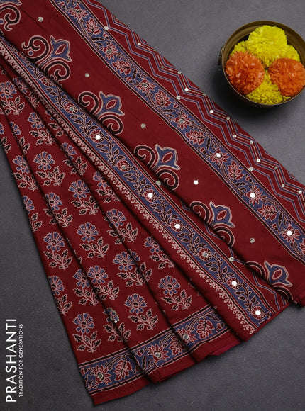 Muslin silk saree red shade with allover ajrakh butta prints and sequin mirror work embroidery pallu