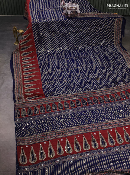 Muslin silk saree indigo blue and maroon shade with allover zigzag prints and sequin mirror work embroidery pallu