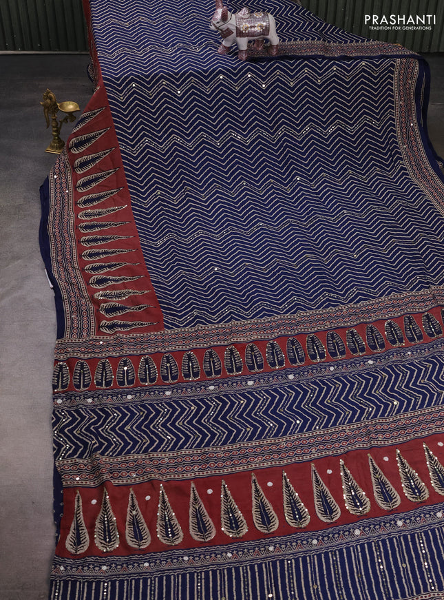 Muslin silk saree indigo blue and maroon shade with allover zigzag prints and sequin mirror work embroidery pallu