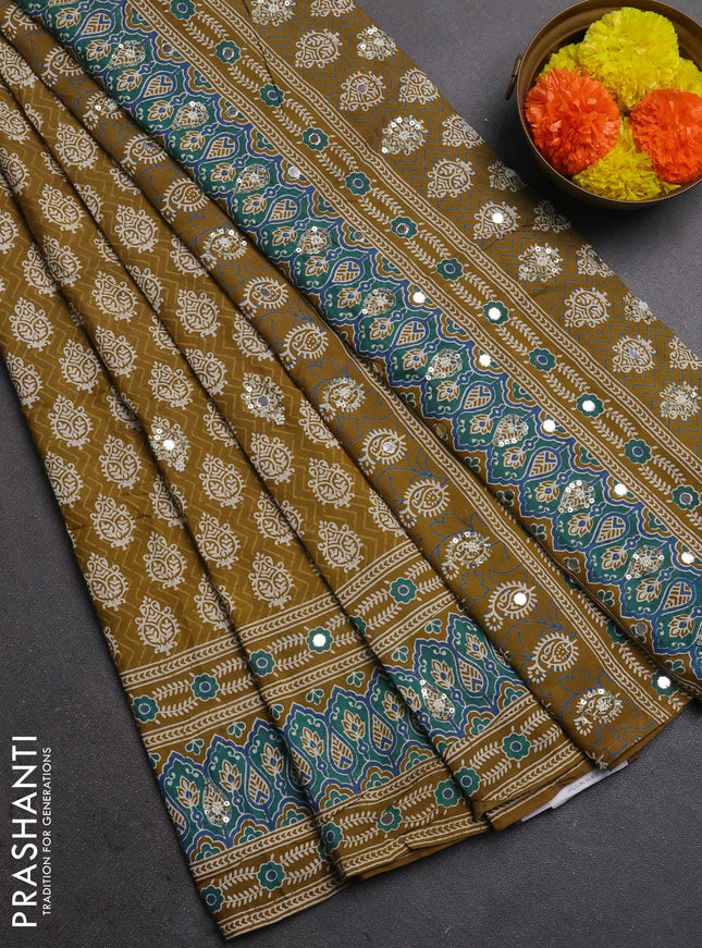 Muslin silk saree mehendi green with allover butta prints and sequin mirror work embroidery pallu