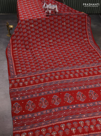 Muslin silk saree red shade with allover floral butta prints and sequin mirror work embroidery pallu