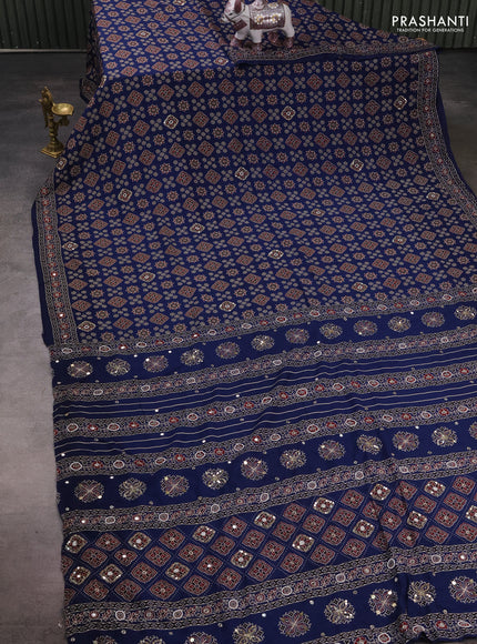 Muslin silk saree indigo blue with allover ajrakh prints and sequin mirror work embroidery pallu