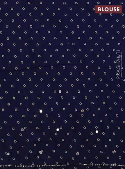 Muslin silk saree indigo blue with allover ajrakh prints and sequin mirror work embroidery pallu