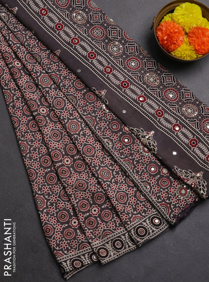Muslin silk saree grey with allover ajrakh prints and sequin mirror work embroidery pallu
