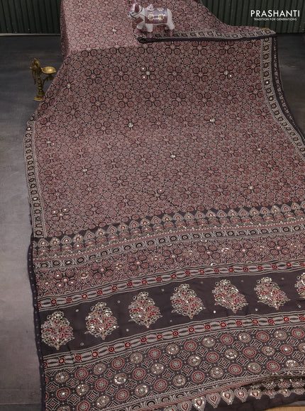 Muslin silk saree grey with allover ajrakh prints and sequin mirror work embroidery pallu