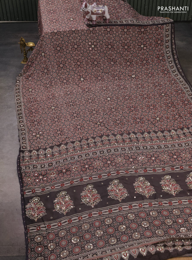Muslin silk saree grey with allover ajrakh prints and sequin mirror work embroidery pallu