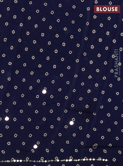 Muslin silk saree indigo blue with allover ajrakh prints and sequin mirror work embroidery pallu