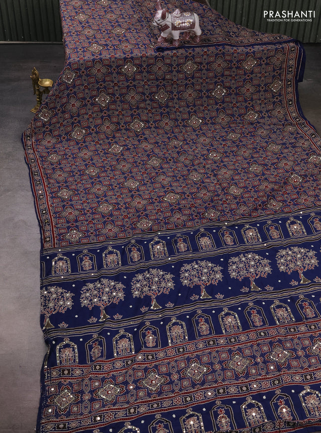 Muslin silk saree indigo blue with allover ajrakh prints and sequin mirror work embroidery pallu