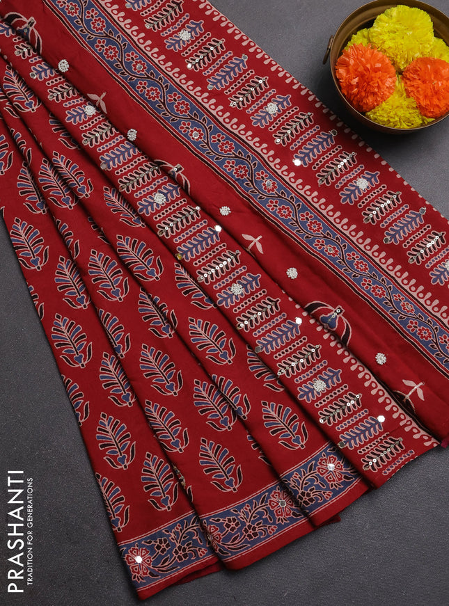 Muslin silk saree maroon with allover butta prints and sequin mirror work embroidery pallu