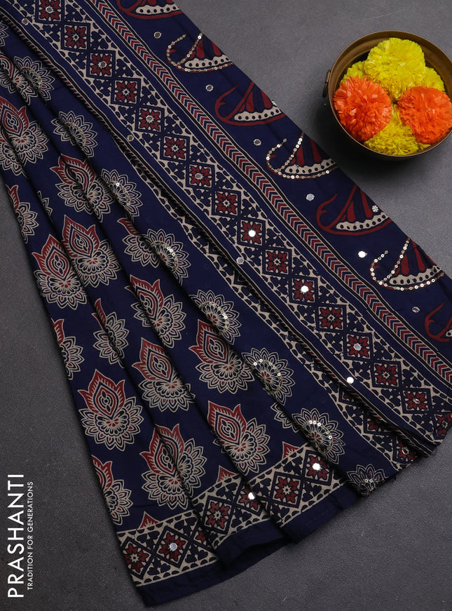 Muslin silk saree indigo blue with allover ajrakh butta prints and sequin mirror work embroidery pallu