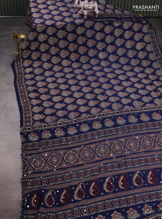 Muslin silk saree indigo blue with allover ajrakh butta prints and sequin mirror work embroidery pallu