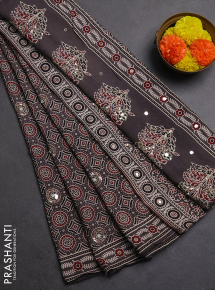 Muslin silk saree grey with allover ajrakh prints and sequin mirror work embroidery pallu