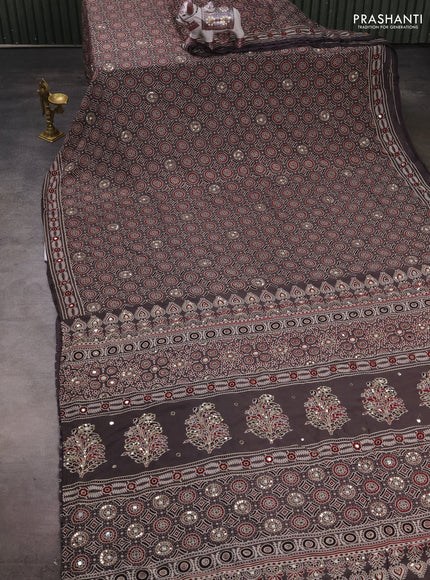 Muslin silk saree grey with allover ajrakh prints and sequin mirror work embroidery pallu