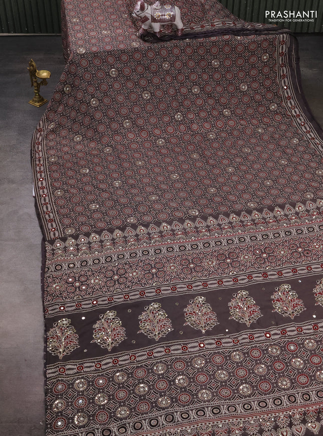 Muslin silk saree grey with allover ajrakh prints and sequin mirror work embroidery pallu