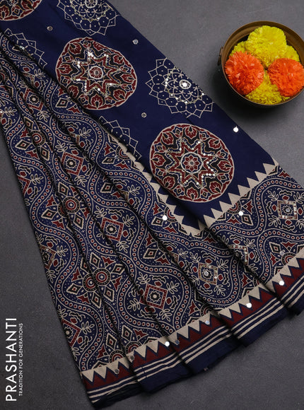 Muslin silk saree indigo blue with allover ajrakh prints and sequin mirror work embroidery pallu