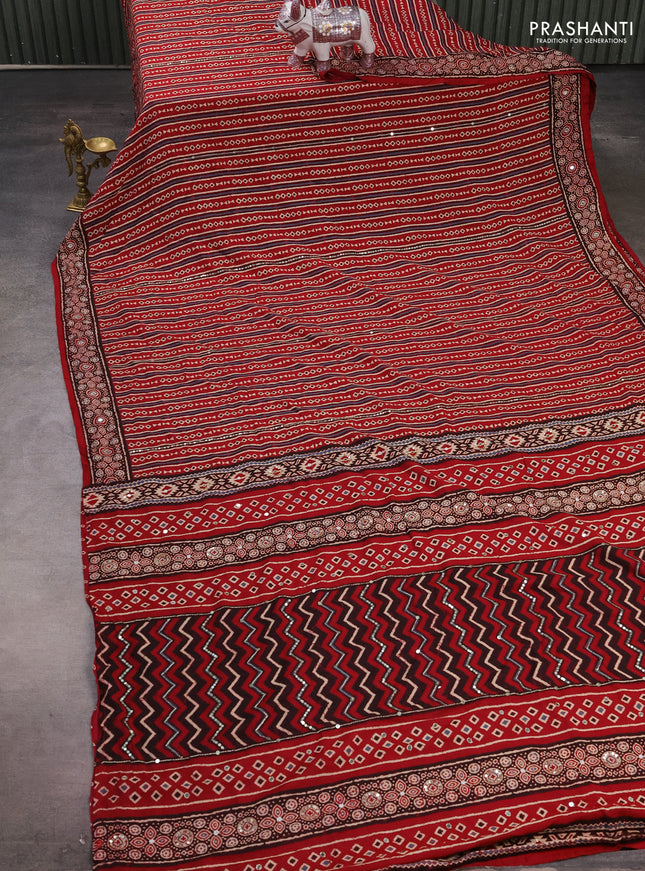 Muslin silk saree red shade with allover geometric prints and sequin mirror work embroidery pallu
