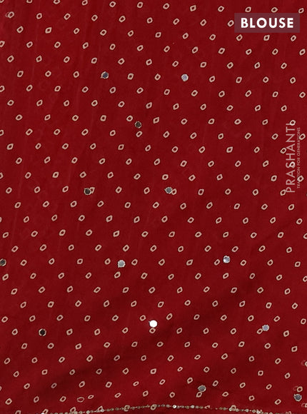 Muslin silk saree red shade with allover geometric prints and sequin mirror work embroidery pallu
