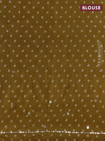 Muslin silk saree mehendi green with allover dabu butta prints and sequin mirror work embroidery pallu