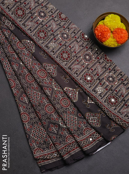 Muslin silk saree grey with allover prints and sequin mirror work embroidery pallu