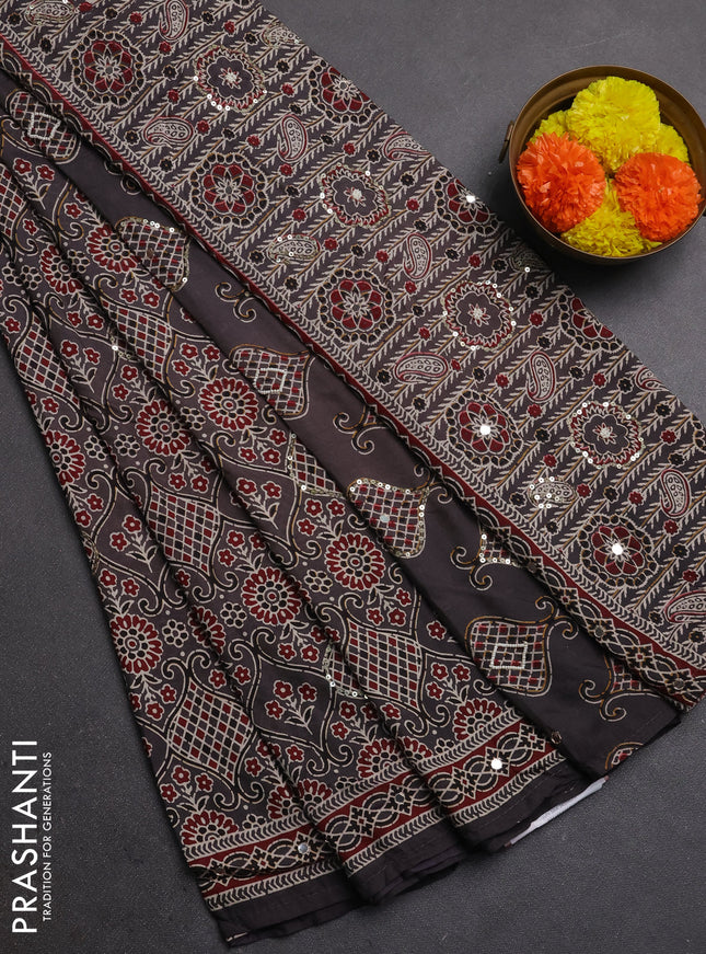 Muslin silk saree grey with allover prints and sequin mirror work embroidery pallu