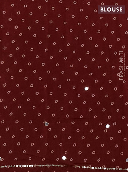 Muslin silk saree red shade with allover butta prints and sequin mirror work embroidery pallu