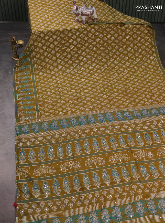 Muslin silk saree mehendi green and red with allover dabu butta prints and sequin mirror work embroidery pallu