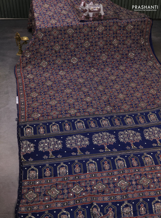 Muslin silk saree indigo blue with allover ajrakh prints and sequin mirror work embroidery pallu