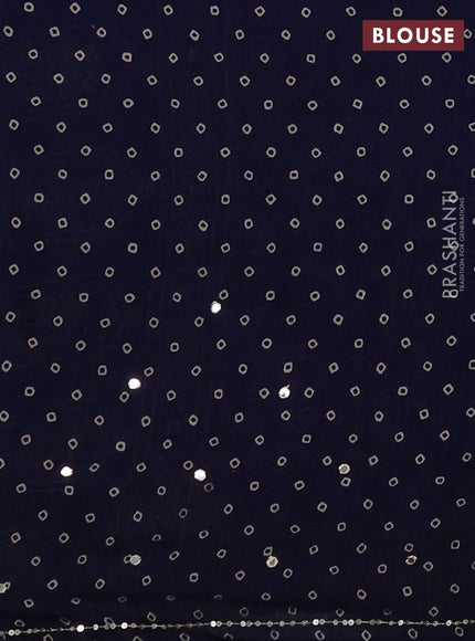 Muslin silk saree indigo blue with allover ajrakh prints and sequin mirror work embroidery pallu