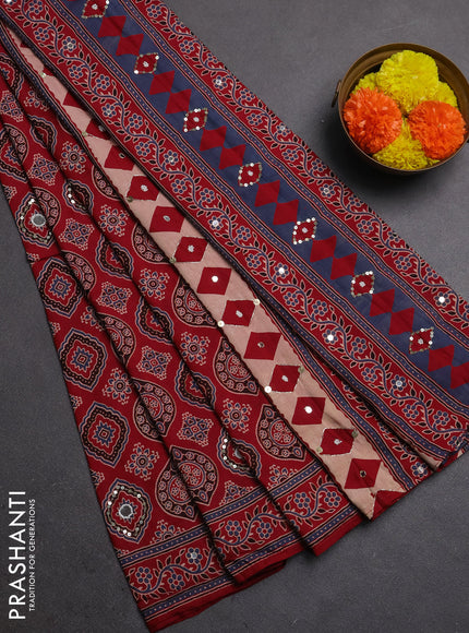 Muslin silk saree red shade with allover ajrakh butta prints and sequin mirror work embroidery pallu