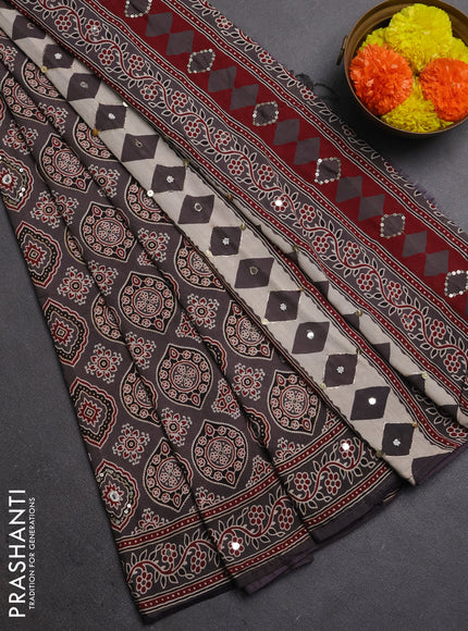 Muslin silk saree grey shade with allover ajrakh prints and sequin mirror work embroidery pallu