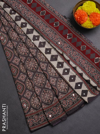 Muslin silk saree grey shade with allover ajrakh prints and sequin mirror work embroidery pallu