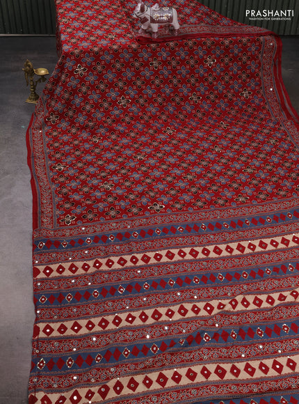 Muslin silk saree red shade with allover butta prints and sequin mirror work embroidery pallu