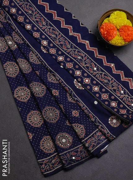 Muslin silk saree navy blue with allover ajrakh butta prints and sequin mirror work embroidery pallu