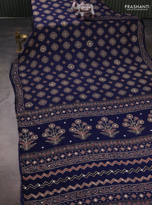 Muslin silk saree navy blue with allover ajrakh butta prints and sequin mirror work embroidery pallu