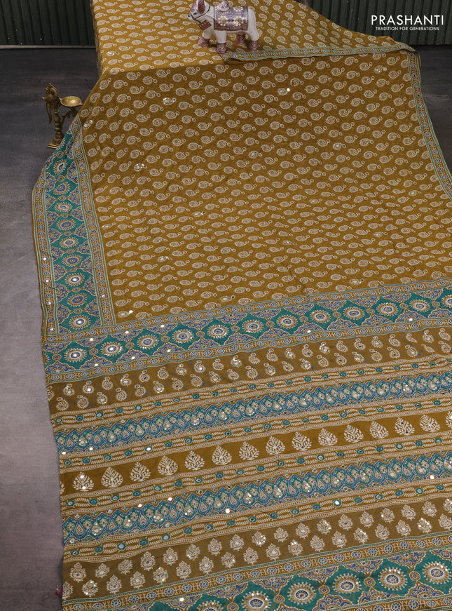 Muslin silk saree mehendi green and teal green with allover dabu butta prints and sequin mirror work embroidery pallu